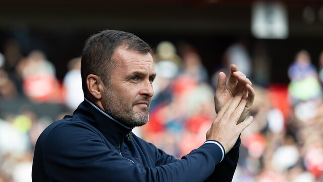 Nathan Jones claps supporters