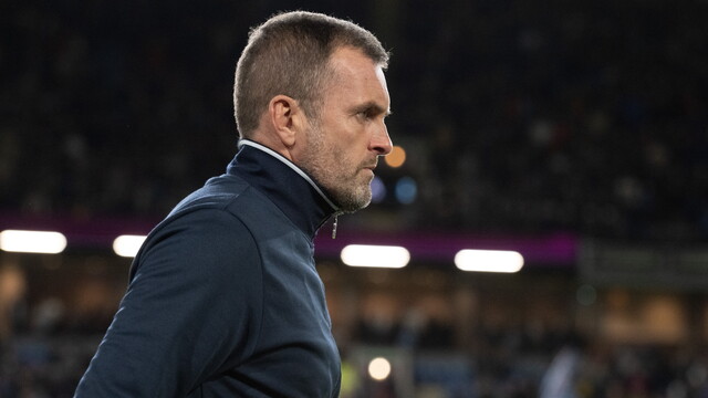 Nathan Jones looks on