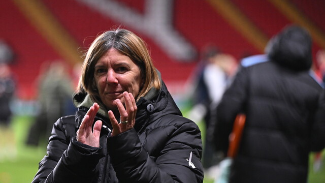 karen hill applauds fans after a win against Bristol City