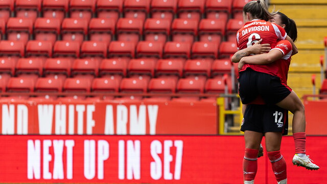 Leah Davidson and Jodie Hutton hug after Davidson scores against Man United