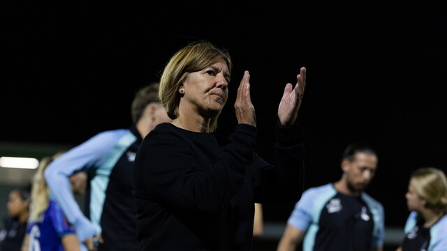 Karen Hills applauds fans after defeat to Crystal Palace