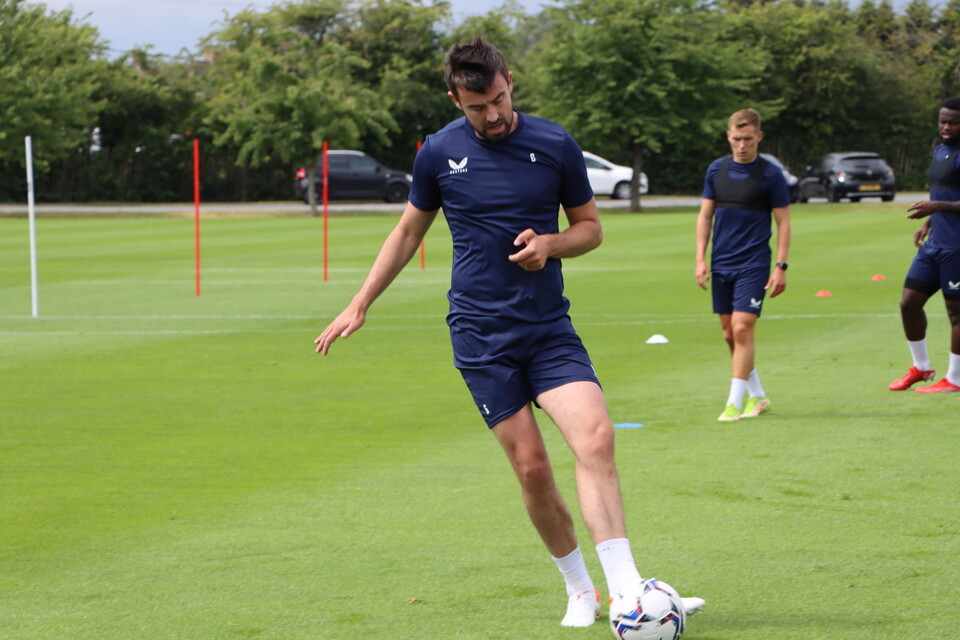 New signing Eoghan O'Connell passes the ball with his left boot