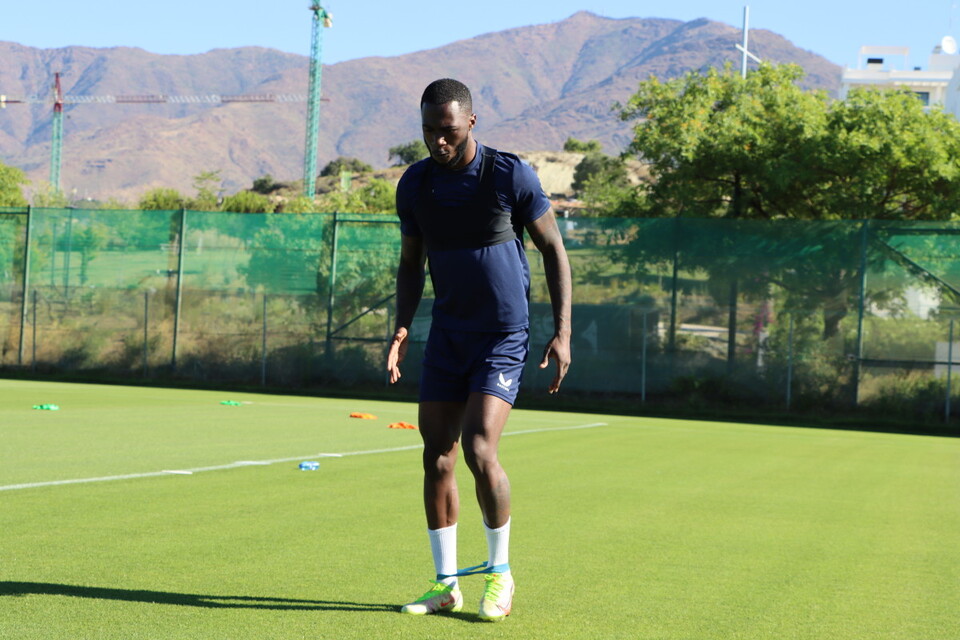 Corey Blackett-Taylor using an exercise band