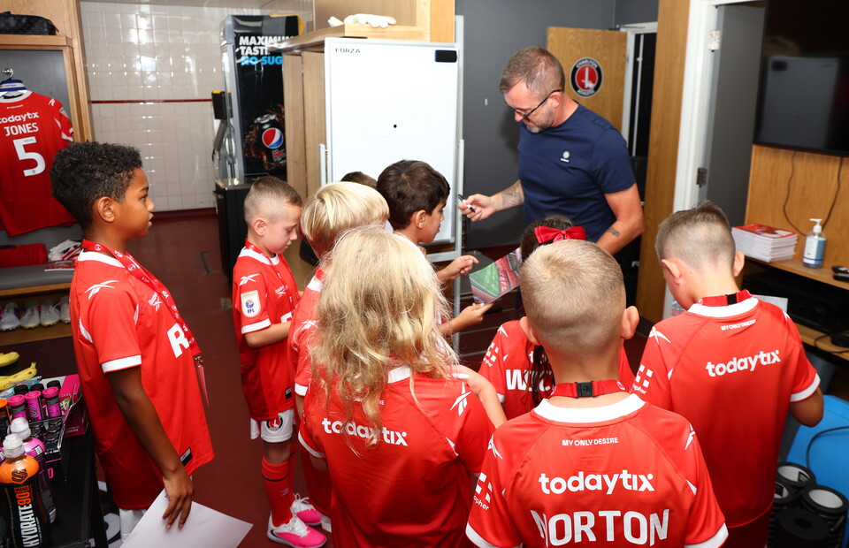 The matchday mascots pay Nathan Jones a visit
