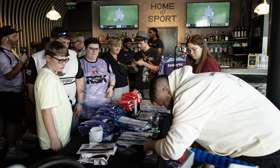 Fans and shirts at women's season preview event