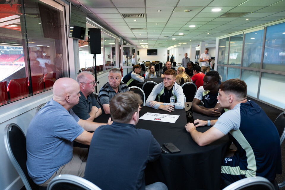 Supporters and Players at The Valley 