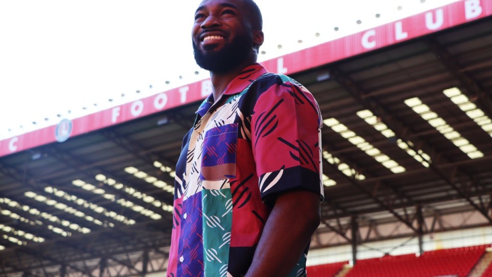 Mandela Egbo takes in his surroundings at The Valley after signing for Charlton