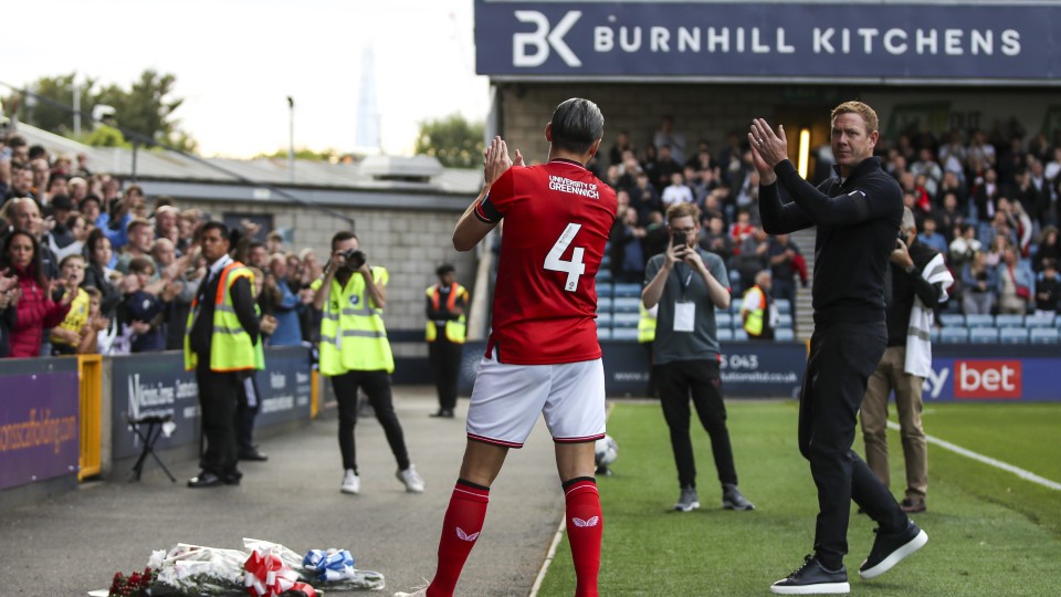 George Dobson and Dean Holden salutes both sets of supporters