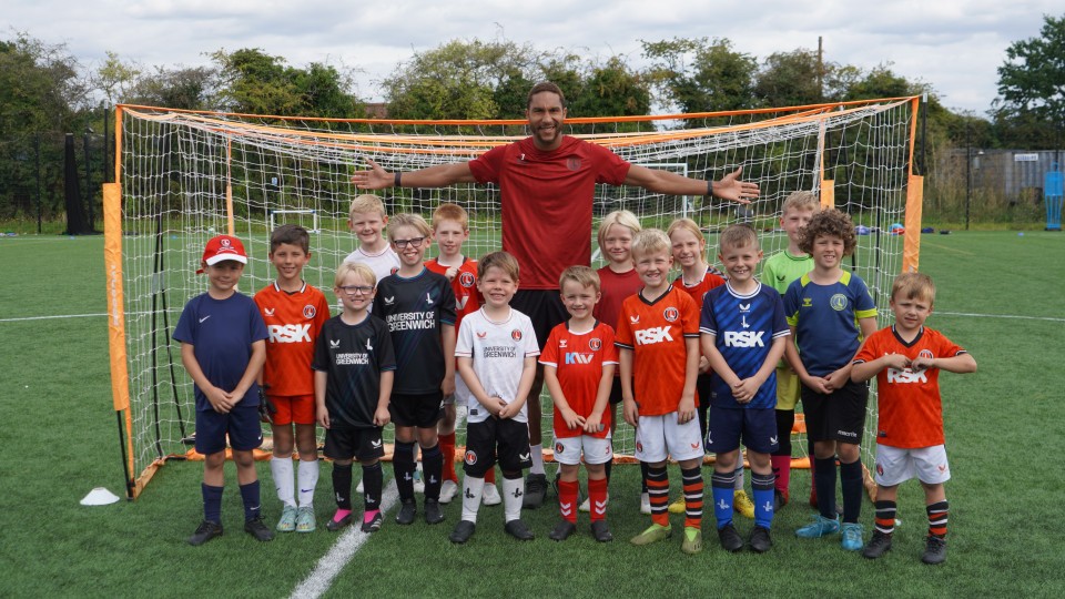Terell Thomas posing with Charlton fans