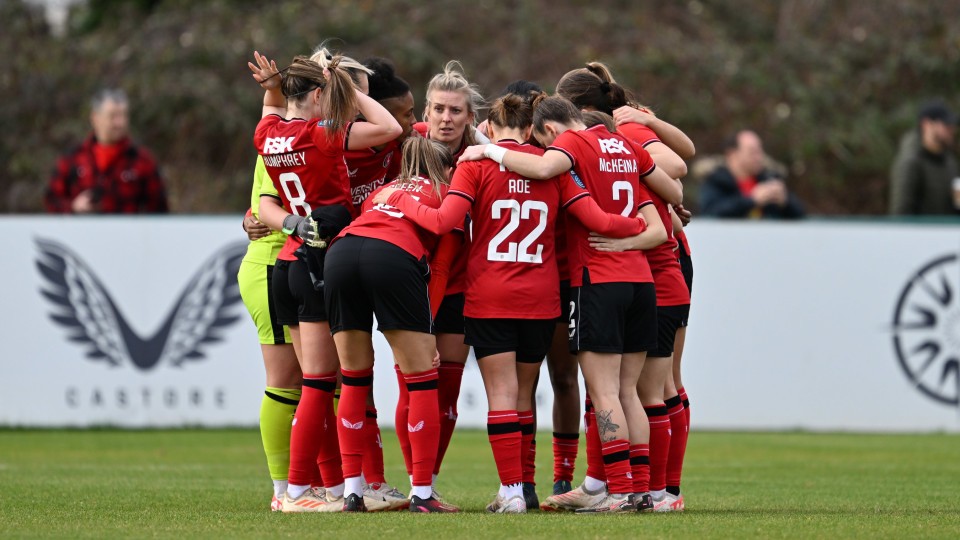 Women's team huddle