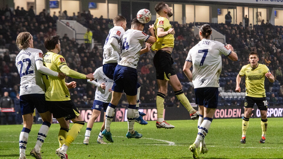 Charlton battle for the ball