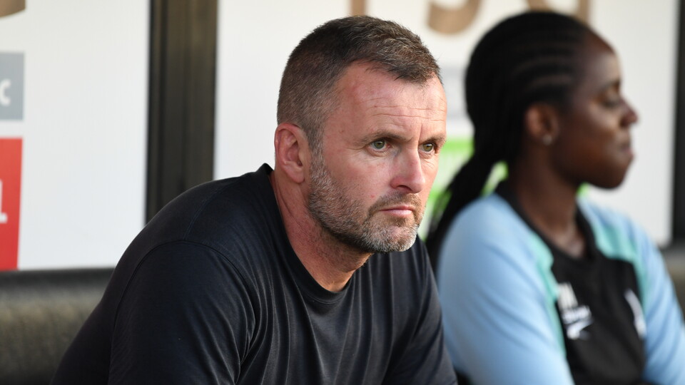 Nathan Jones looks on