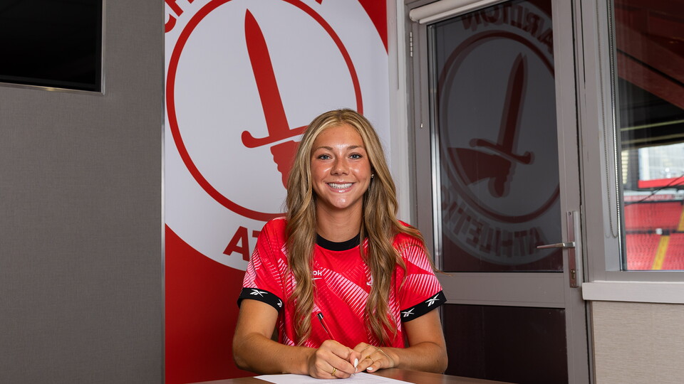 Gillian signing contract