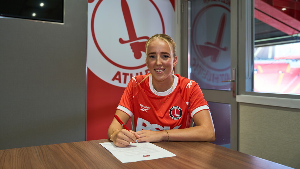 Charlotte Newsham signing contract