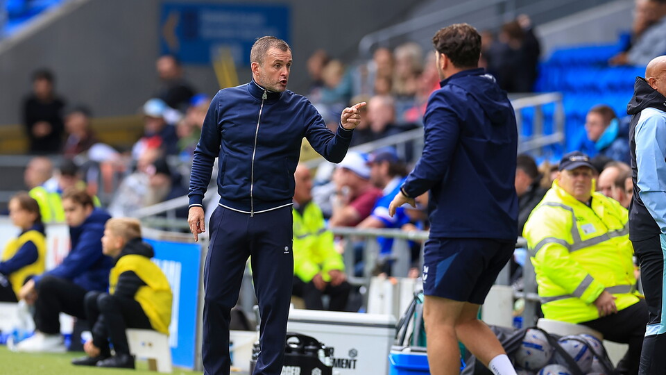 Nathan Jones looks on