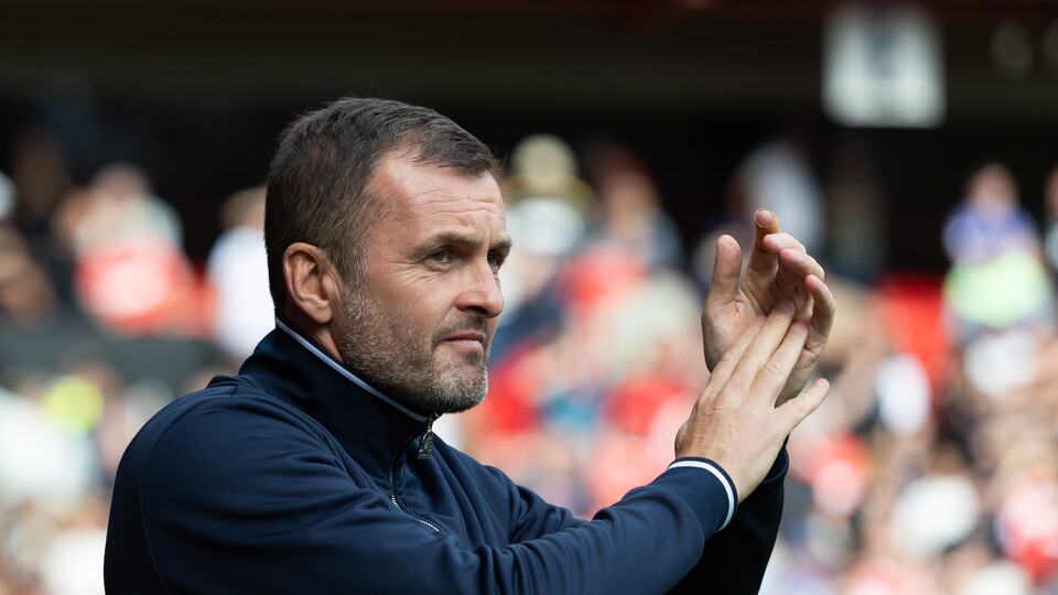 Nathan Jones claps supporters