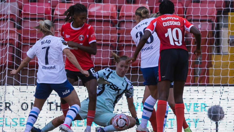 Sophie Whitehouse makes a save against Man City 