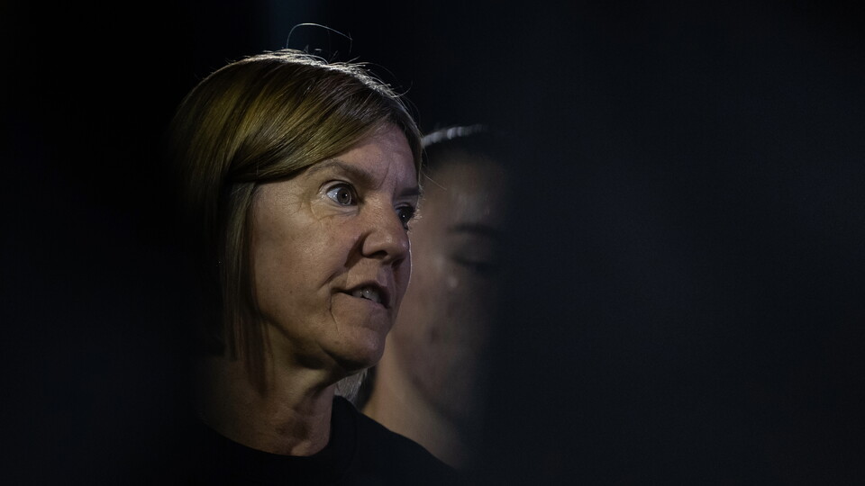Karen Hills talks to her team
