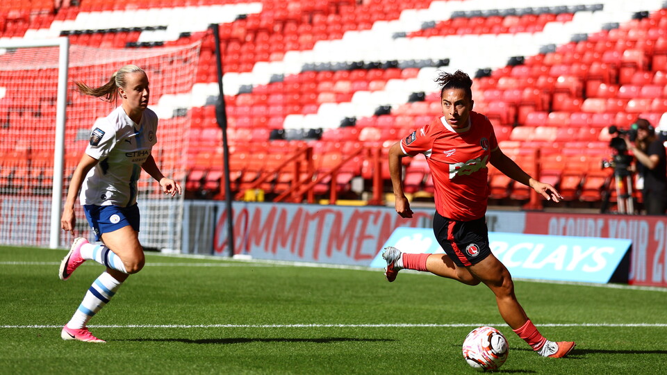 Lucia Lobato defends against Man City in the first half at the valley
