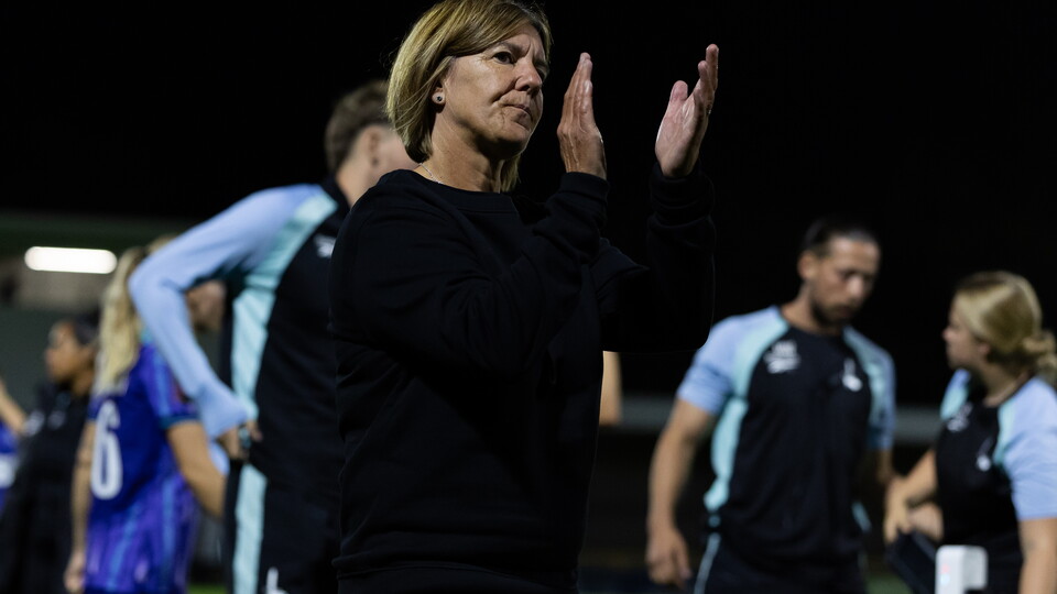 Karen Hills applauds the Charlton supporters after defeat to Palace