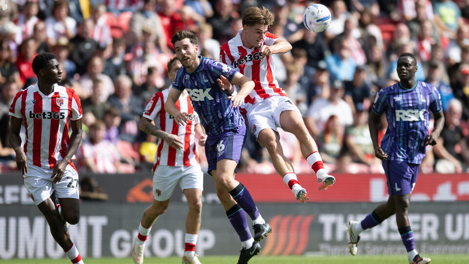Joe Rankin-Costello battles for the ball