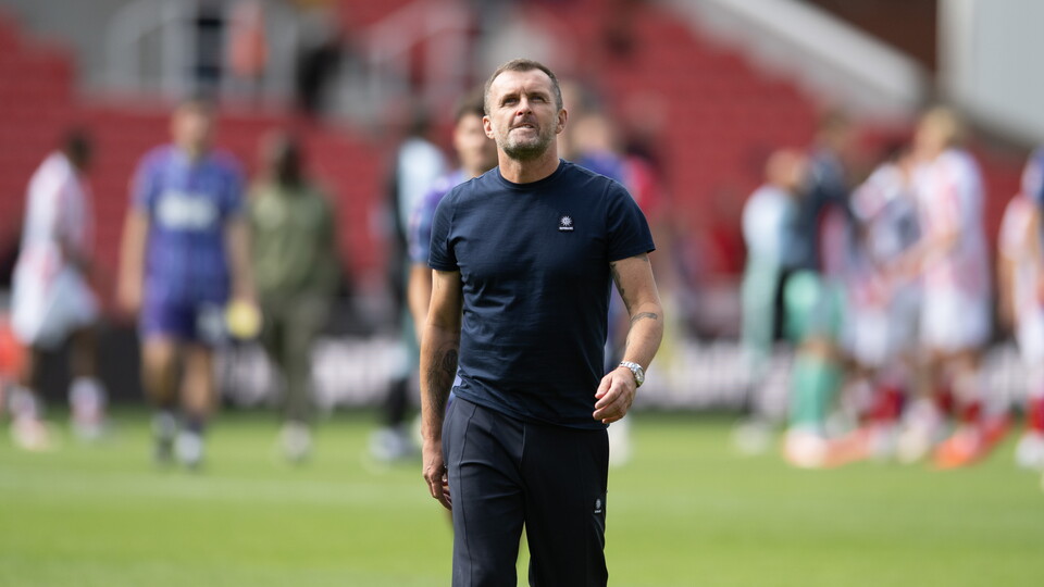 Nathan Jones looks on