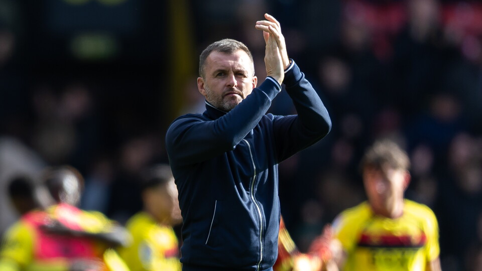 Nathan Jones claps supporters