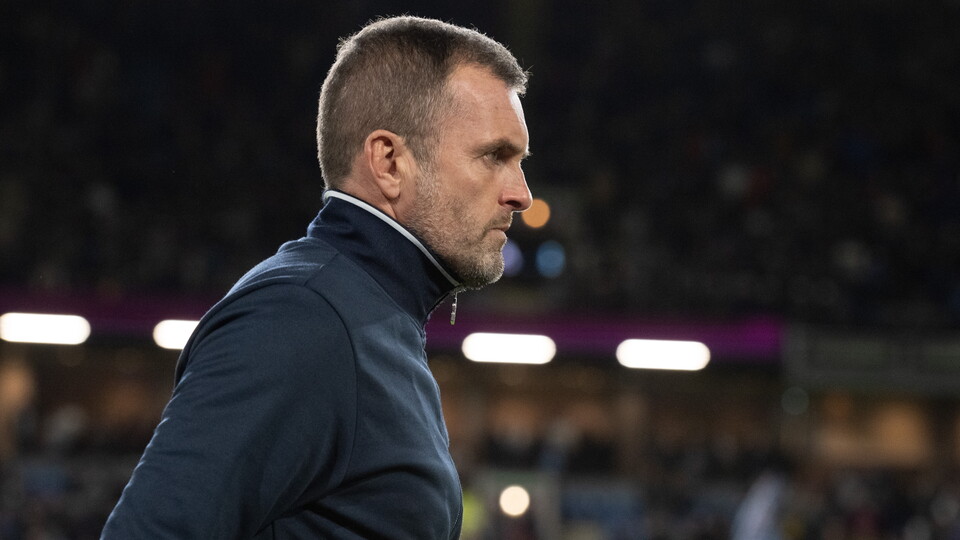 Nathan Jones looks on