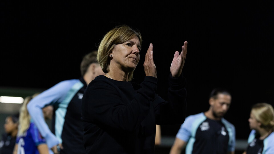 Karen Hills applauds fans after defeat to Crystal Palace